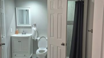 Hair dryer, towels, soap, toilet paper