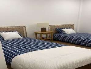 Apartamento | 2 dormitorios y tabla de planchar con plancha