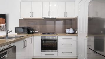 Apartment | Private kitchen | Fridge, coffee/tea maker, electric kettle, toaster