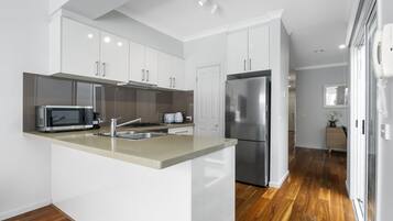 Apartment | Private kitchen | Fridge, coffee/tea maker, electric kettle, toaster