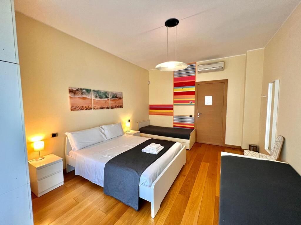 Chambre Quadruple Confort, vue jardin | Wi-Fi gratuit