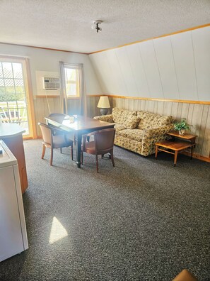 Suite Deluxe, balcone | Area soggiorno