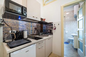 Apartment | Private kitchen | Cleaning supplies - Charming Apartment, Central and Cozy (Zadar)