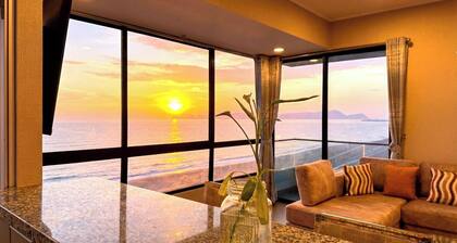 "Oceanfront 2BR, Home Office, Pool, Gym, Sauna, BBQ, Play area and Free Parking"