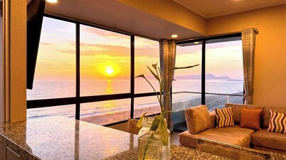 "Oceanfront 2BR, Home Office, Pool, Gym, Sauna, BBQ, Play area and Free Parking"