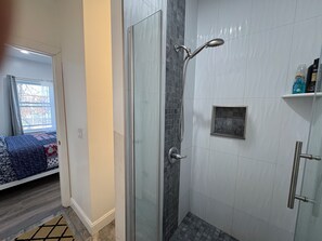 Shower, towels, soap, toilet paper