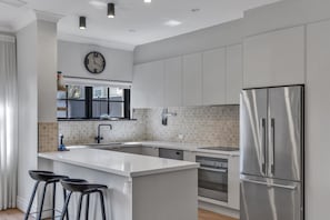 Apartment | Private kitchen - Family Retreat With Balcony and Courtyard (Adelaide)