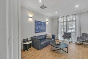 Apartment | Living room - Family Retreat With Balcony and Courtyard (Adelaide)
