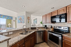 Fridge, microwave, oven, stovetop - 2BR 2Ba King Bed Oceanfront Condo with Pools (North Myrtle Beach)