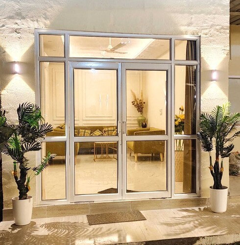 Cozy 4-bedroom cottage in enchanting Gurugram with AC,swimming pool,open bar,dj