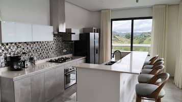 Standard Apartment, Balcony, Pool View | Private kitchen | Full-sized fridge, microwave, oven, stovetop