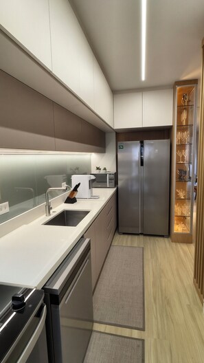 Private kitchen - New and cozy apartment in Curitiba. (Curitiba)