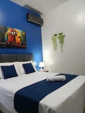 1 habitación, tabla de planchar con plancha, wifi y ropa de cama 