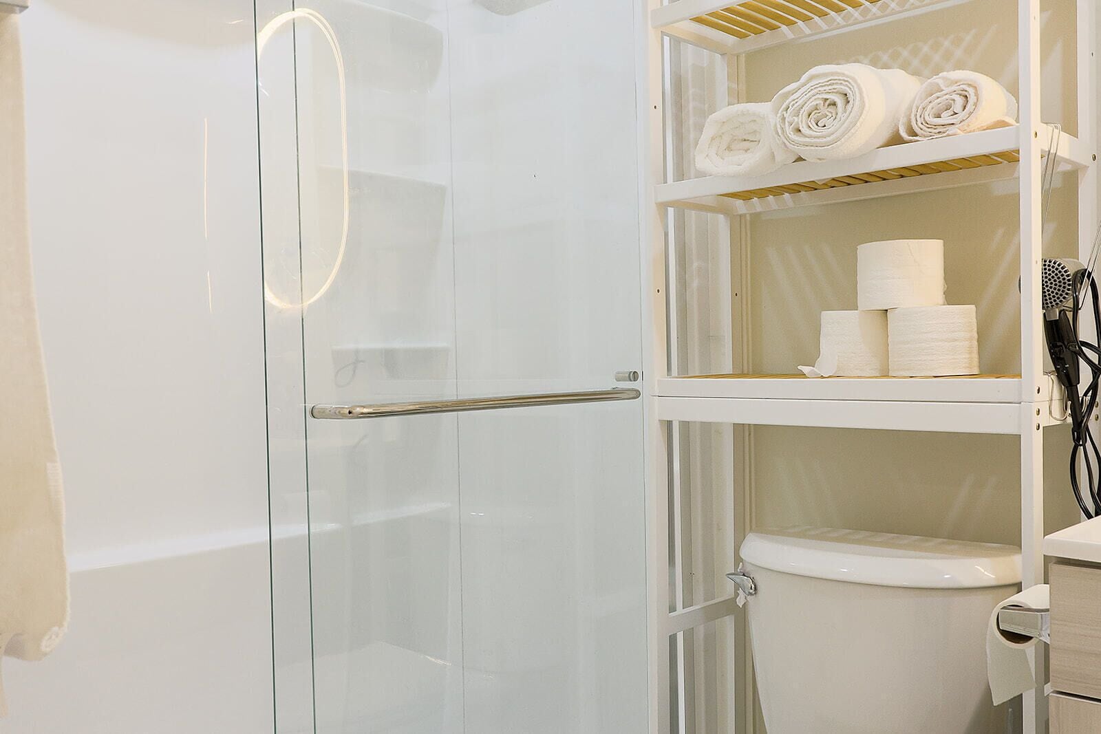 Shower, hair dryer, towels, soap