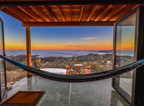 The New Way cabin: off-grid tiny cabin with ocean and mountain views.