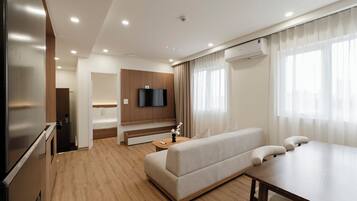 Minibar, desk, blackout curtains, iron/ironing board