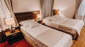 Deluxe Suite, Resort View | In-room safe, desk, laptop workspace, iron/ironing board