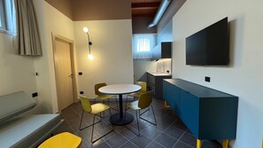 Comfort Apartment | Living area | TV