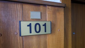 A wooden door with a number plate displaying '101'. - Hotel Razlog (Razlog)