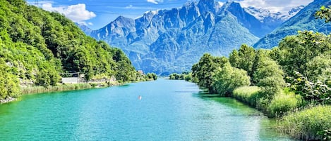 A river with mountains in the background.