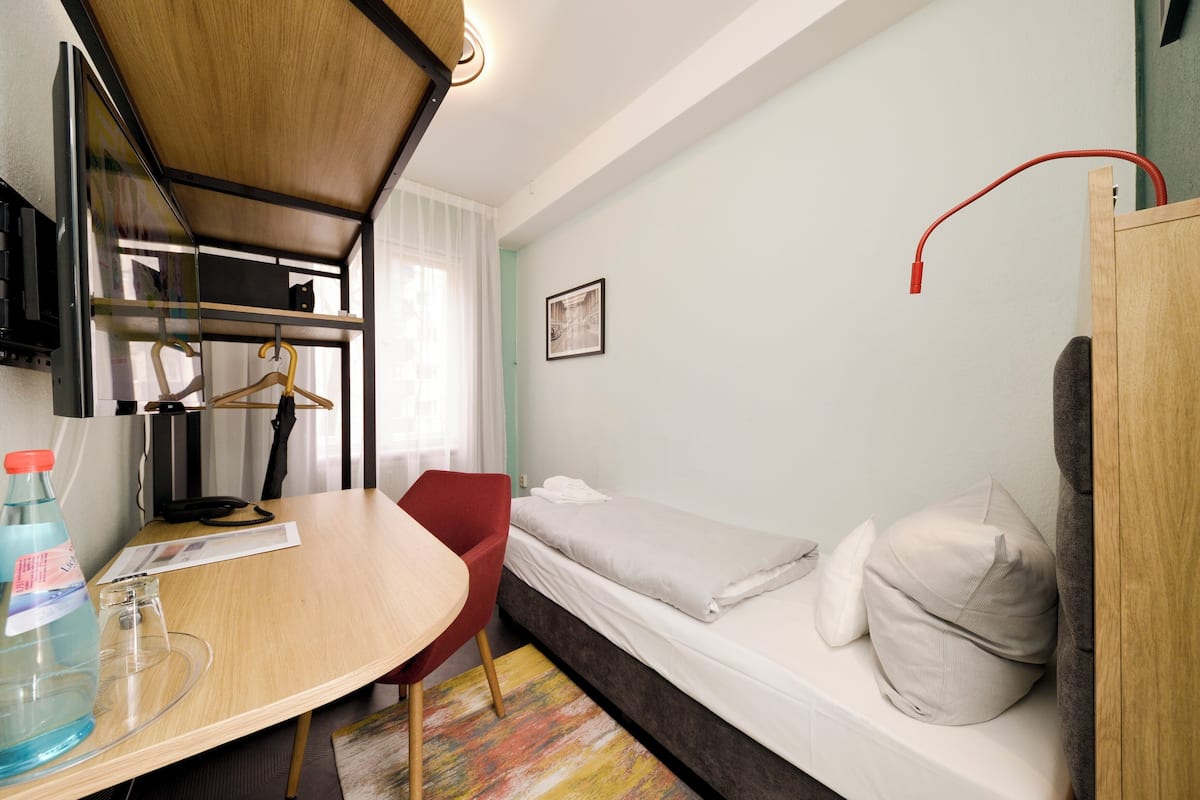 Habitación individual, para no fumadores, baño privado | Ropa de cama de alta calidad y caja de seguridad en la habitación