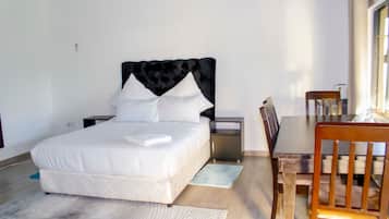 In-room safe, desk, laptop workspace, blackout curtains