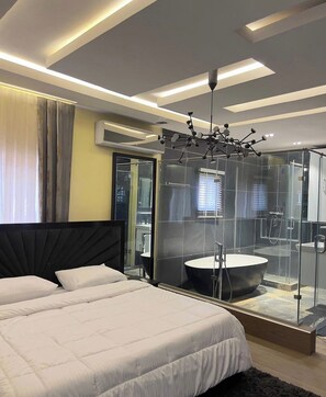 Desk, laptop workspace, blackout curtains, soundproofing - Reign Luxury Apartment  (Abuja)