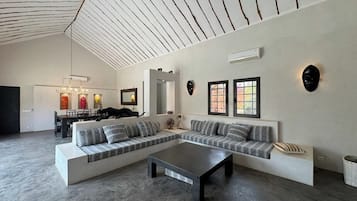 Superior Villa, Patio, Pool View | Living area