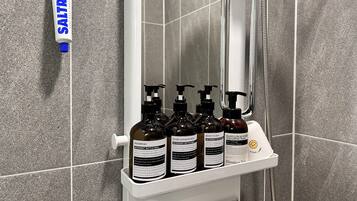 Hair dryer, bidet, towels, soap