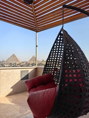 Unclassified image, 5 of 29, button - Rafif Pyramid View (Giza)