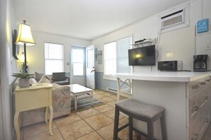 Living area - Cozy, cute 1-bedroom oceanfront condo with WiFi and a great ocean view located downtown directly on the Boardwalk and mere steps to the beach! (Ocean City)
