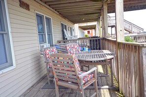 Outdoor dining - Cozy, cute 1-bedroom oceanfront condo with WiFi and a great ocean view located downtown directly on the Boardwalk and mere steps to the beach! (Ocean City)