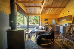 Chalet, River View | Living area | Fireplace, computer monitors - Wood Cabin by the River (Gortynia)