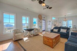 Smart TV, fireplace, books - Experience the perfect beach getaway at Elysium Breeze, Oak Island, NC, with 3 bedrooms. (Oak Island)