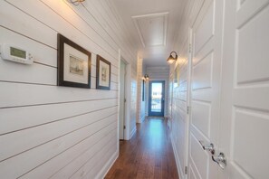 Interior - Experience the perfect beach getaway at Elysium Breeze, Oak Island, NC, with 3 bedrooms. (Oak Island)