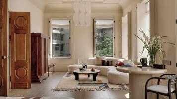 Luxury Suite, City View | Desk, laptop workspace, blackout curtains, iron/ironing board