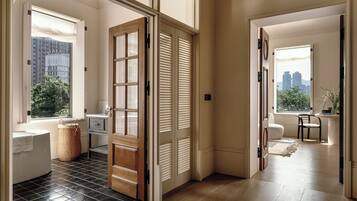 Luxury Suite, City View | Desk, laptop workspace, blackout curtains, iron/ironing board