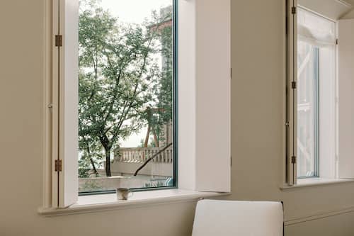 Superior Double Room, City View | Desk, laptop workspace, blackout curtains, iron/ironing board