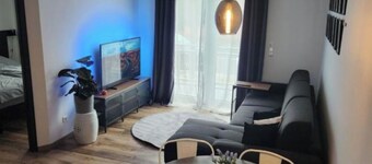Modern 2-room vacation apartment with balcony and space for up to 4 guests