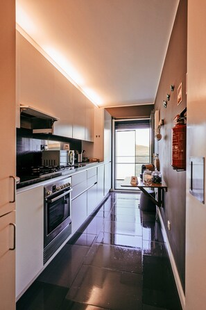 Apartment | Private kitchen - Bridge View Apartment in Sacavem (Lisbon)