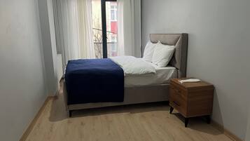 Classic Apartment, 1 Double Bed, Non Smoking, City View | Laptop workspace, iron/ironing board, bed sheets