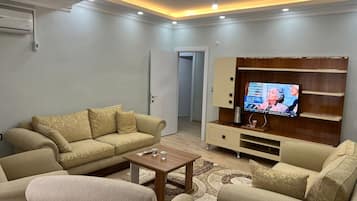 Classic Apartment, City View | Laptop workspace, iron/ironing board