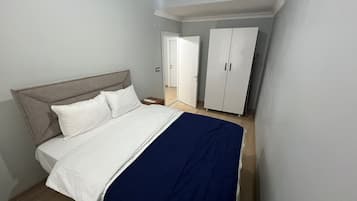 Laptop workspace, iron/ironing board