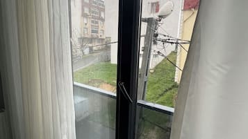 Classic Apartment, 1 Double Bed, Non Smoking, City View | Laptop workspace, iron/ironing board, bed sheets