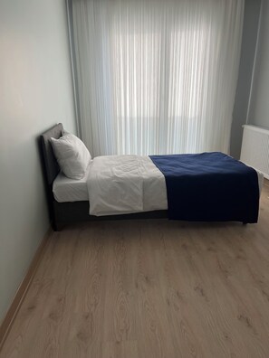 Appartement Confort, 2 chambres, vue sur la ville | Literie de qualité, espace de travail pour ordinateurs portables
