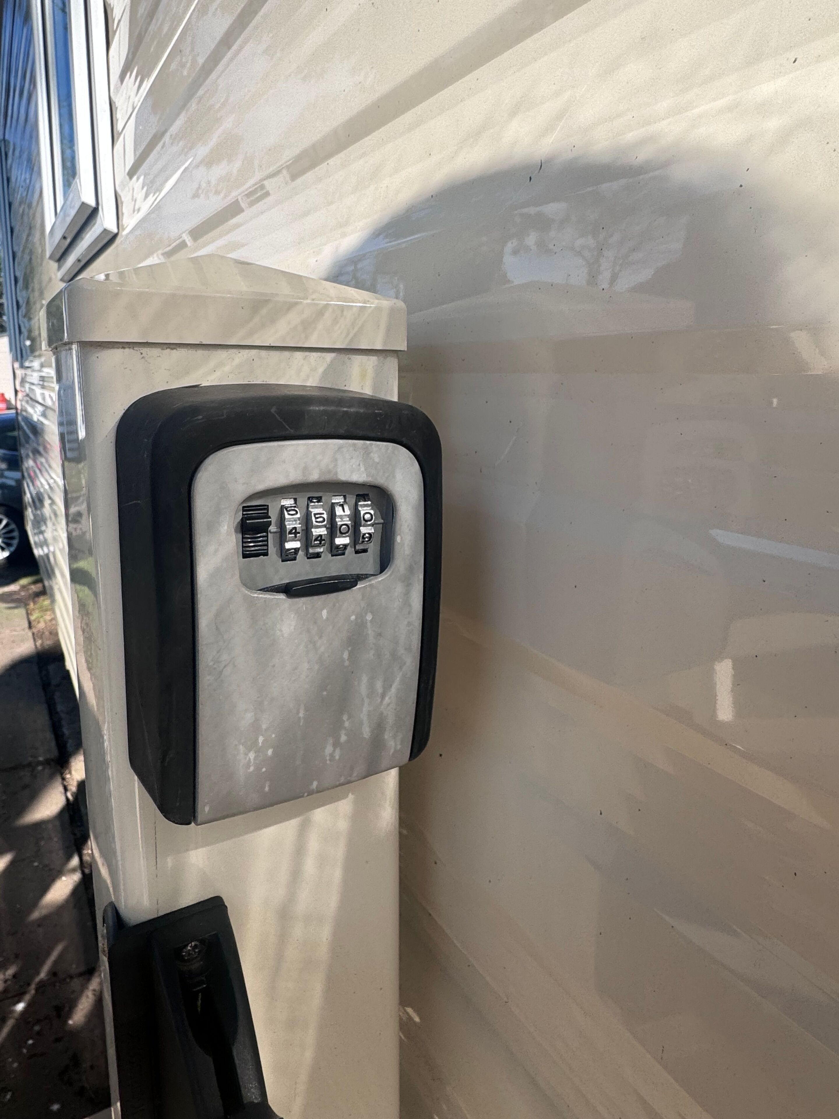 A parking meter with a keypad and a coin slot.