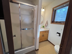 Shower, hair dryer, towels, soap