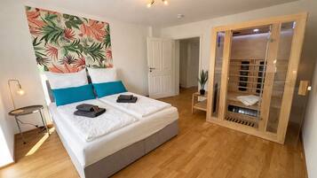 Desk, travel crib, free WiFi, bed sheets