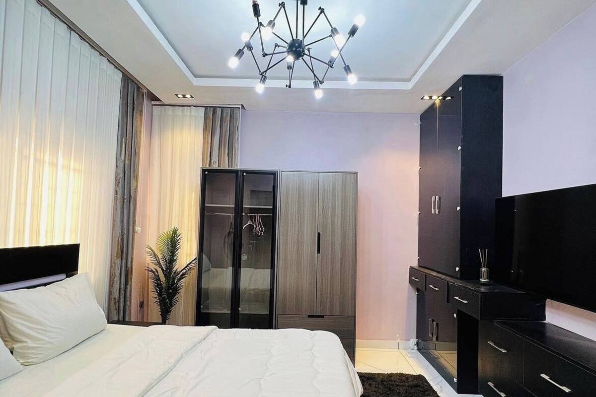 Deluxe Room, Balcony, City View | Desk, laptop workspace, blackout drapes, soundproofing
