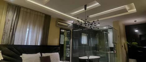 Deluxe Room, Balcony, City View | Desk, laptop workspace, blackout drapes, soundproofing